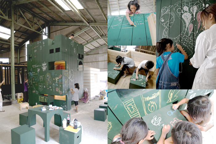 伊賀市の製材所に建つ小屋の黒板塗料による外観